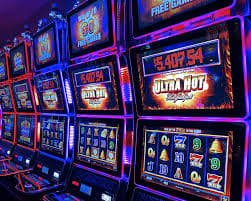 Starburst slot interface showing five reels and jewel symbols